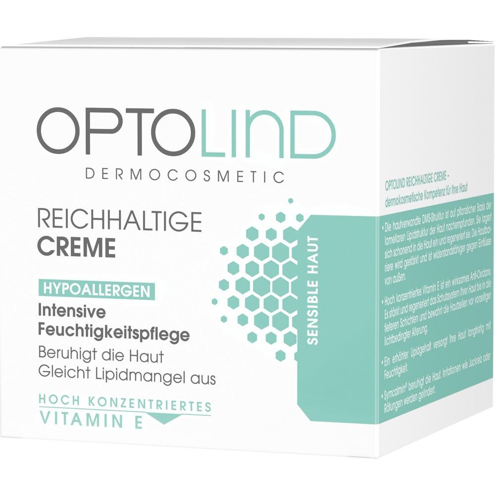 Weiße Creme-Verpackung mit grauem und grünem Text über Feuchtigkeitspflege für sensible Haut.