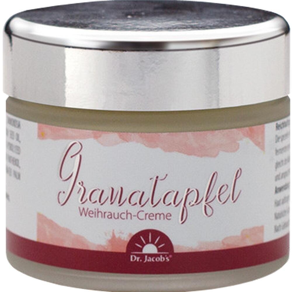 Eine Creme mit Granatapfel- und Weihrauch-Aroma in einem Glas mit silbernem Deckel.